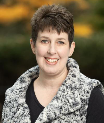 Headshot of librarian Stacey Brownlie a white woman with brown hair