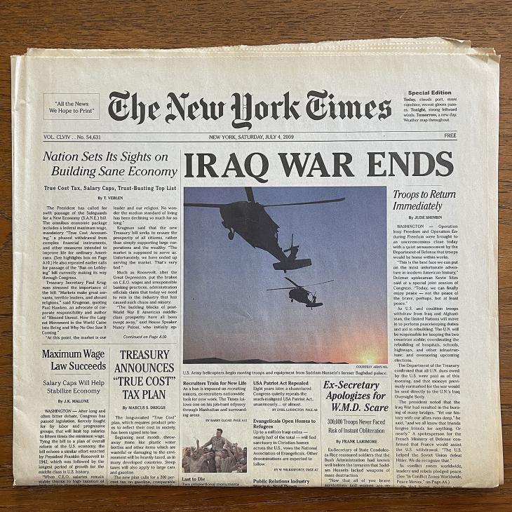 A newspaper on a wooden table