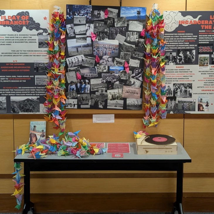 Posters describing the day of remembrance with images and paper cranes