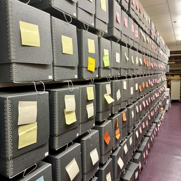 Shelves of gray archival boxes used to store our collection of 7,000+ pamphlets