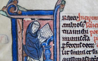 Detail of a manuscript page, with black & red text and colored illustration