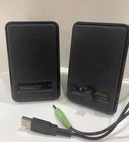 Two connected USB computer speakers with audio jack