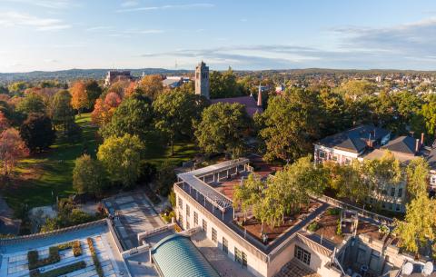 Birds-eye view of Tufts campus with Tisch Library in foreground and Goddard Chapel in background
