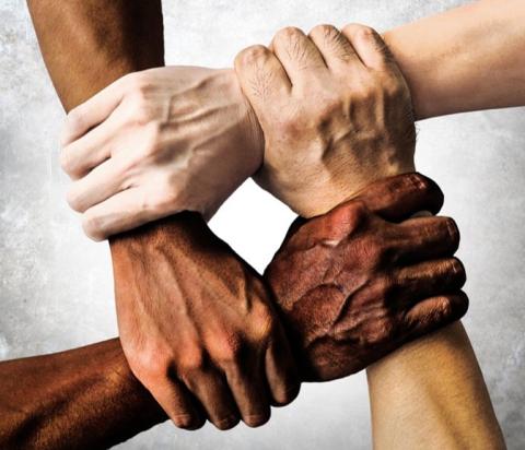 hands and arms linked in a square shape