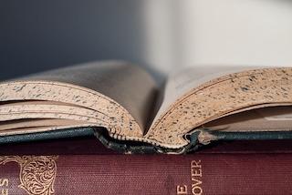 Open book set on top of another book
