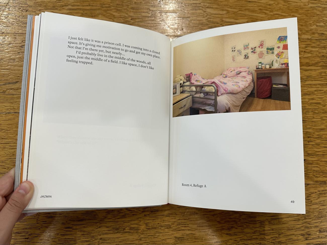 Text and a photograph on the pages of an open book