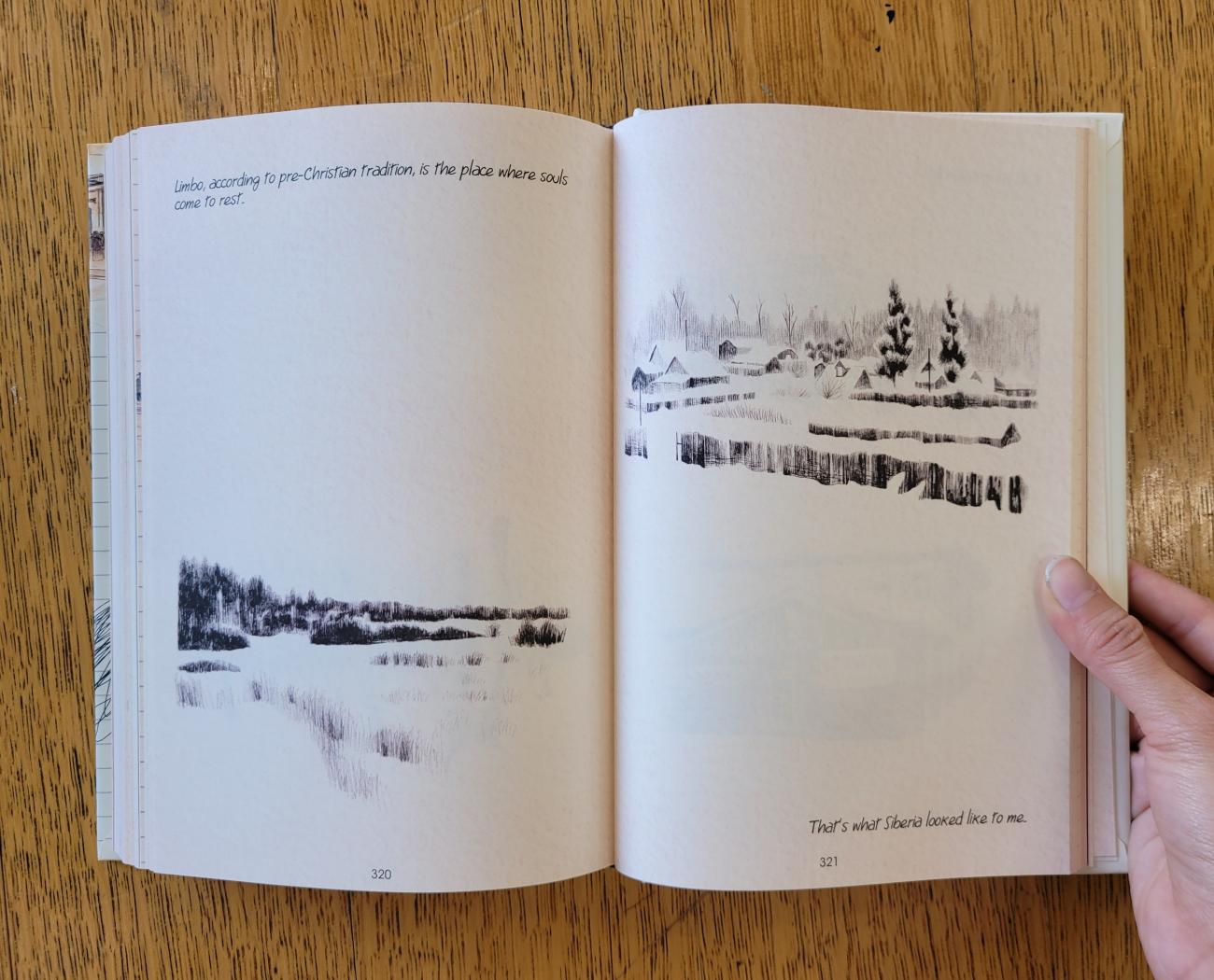 Pages of drawings inside an open book