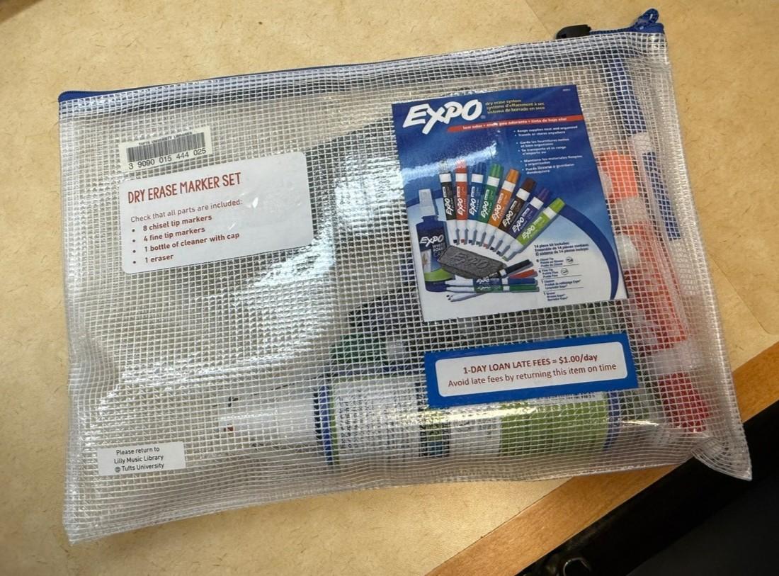 Image of dry erase marker set as it is at the music library - in a plastic zippered pouch with barcode and content list