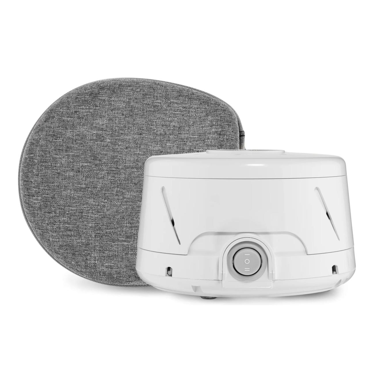 Photo of a white noise machine and its travel case