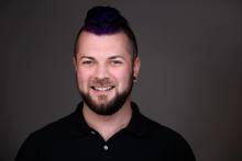 A headshot of Tufts Research Librarian for Music, Patrick Quinn