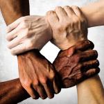 deijupdate.jpg hands and arms linked in a square shape