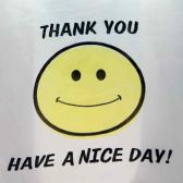 smiley.jpeg yellow smiley face with 'Thank you' above and 'have a nice day' below it from a plastic shopping bag