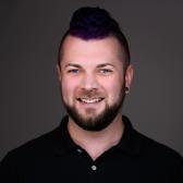 A headshot of Tufts Research Librarian for Music, Patrick Quinn